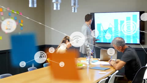 Business Team Analyzing Network Data in Modern Office