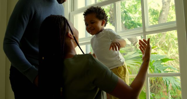 Happy Family Moments at Home with Smiling Child - Download Free Stock Images Pikwizard.com