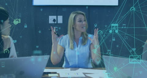 Team Collaborating in Office with Digital Networking Overlay