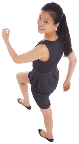 Transparent happy biracial businesswoman walking up stairs