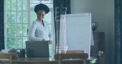 Professional Woman Engaged in Modern Creative Workspace with Flip Chart