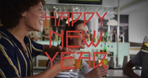 Happy New Year Celebration with Friends in a Modern Bar