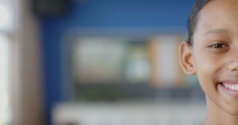 Half Face of Smiling Student in School Classroom with Bright Atmosphere - Download Free Stock Images Pikwizard.com