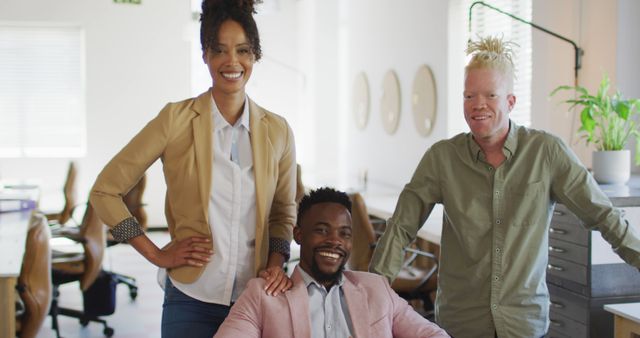 Diverse Team of Smiling Professionals Collaborating in Modern Office - Download Free Stock Images Pikwizard.com