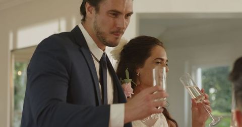 Joyful Wedding Toast with Champagne Celebration