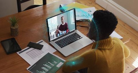 Young Professional Engaged in Video Conference Networking