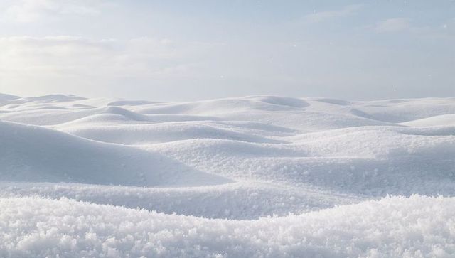 Glittering snow dunes rolling across arctic plain, crystal frost textured expanse