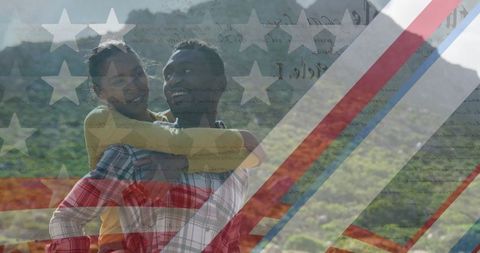 Patriotic Celebration with Diverse Couple in Scenic Mountains