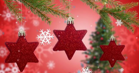 Festive Star Ornaments Decorating Christmas Tree - Download Free Stock Images Pikwizard.com