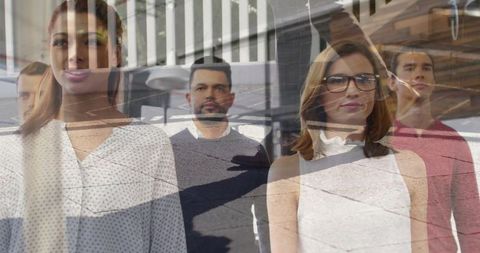 Contemporary office professionals reflected in fantasy glass