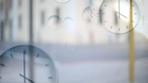Multiple Transparent Clocks Over Blurred Urban Background