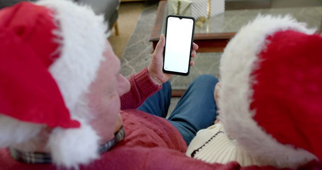 Grandparents Wearing Santa Hats Video Calling During Christmas - Download Free Stock Images Pikwizard.com