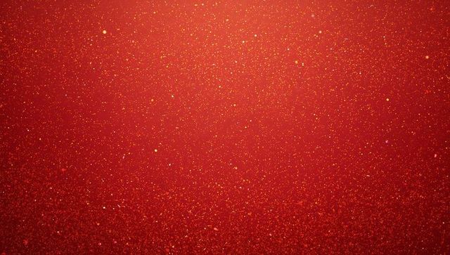 Red glitter gradient background with gold flecks and sparkling bokeh for festive design
