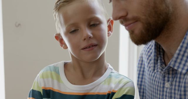 Father and Young Son Sharing a Moment - Download Free Stock Images Pikwizard.com