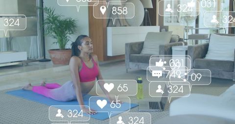 Woman Doing Yoga with Social Media Icons Overhead