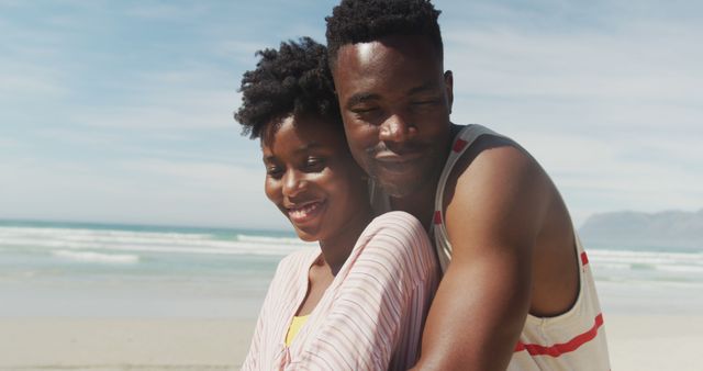 Happy Couple Embracing on Sandy Beach on Bright Summer Day - Download Free Stock Images Pikwizard.com