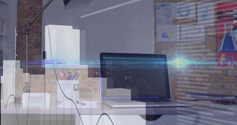 Tech savvy home office setup with laptop and decor