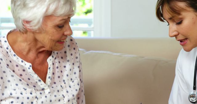 Elderly Woman Having Medical Consultation with Female Doctor - Download Free Stock Images Pikwizard.com