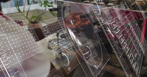 Adjusting camera lens on reflective workstation with augmented reality hud overlays