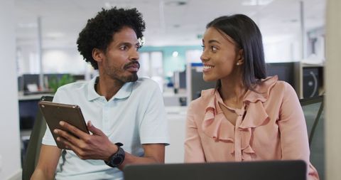 Professionals Discussing in Modern Office