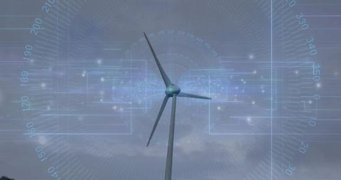 Digital overlay on wind turbine horizon highlighting clean energy technology