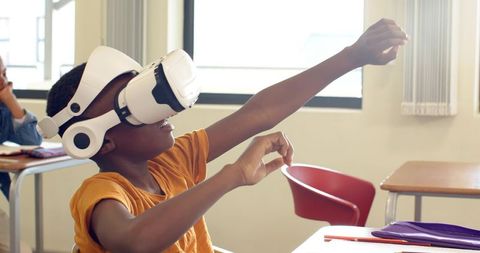 African American Child Immersed in Virtual Reality Classroom