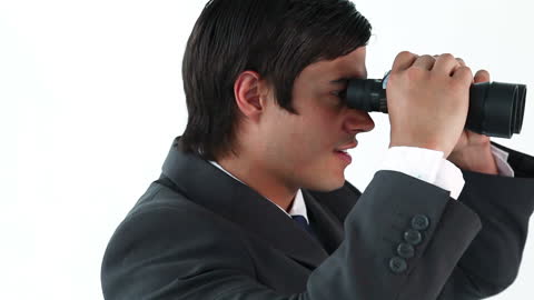Ambitious Businessman Using Binoculars for Future Vision