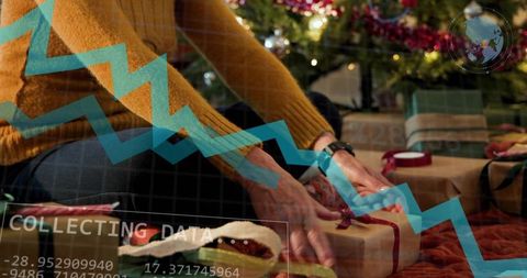 Woman wrapping christmas gift with data overlay showing holiday shopping trends