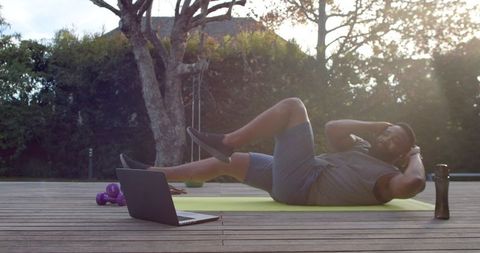 Outdoor Home Workout Following Online Video for Fitness