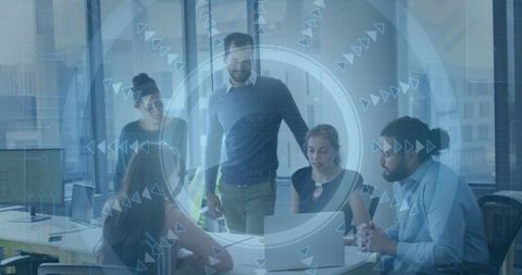 Diverse professionals discuss technology strategies at conference table