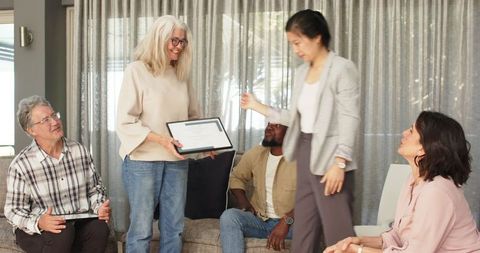 Diverse therapy group award ceremony inspiring mental health achievement