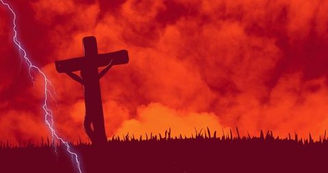 Crucifixion Silhouette Against Dramatic Red Sky with Lightning