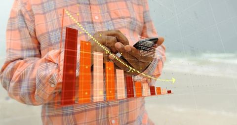 Senior man tapping phone analyzing market data with rising bars and dip line on beach