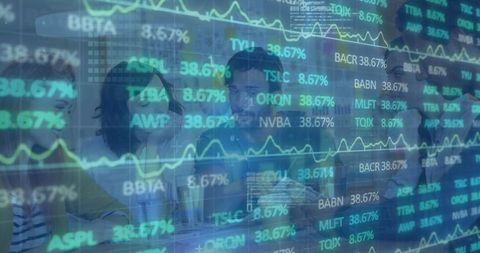 Diverse team analyzing global stock market trends in modern office