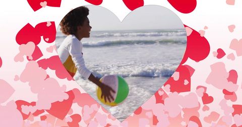 Children Playing with Beach Ball on Sandy Beach