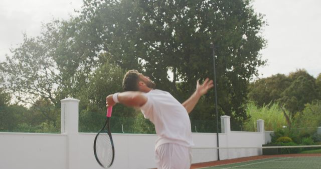 Male Tennis Player Preparing Serve on Outdoor Court - Download Free Stock Images Pikwizard.com