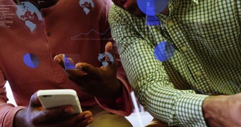 Colleagues analyzing mobile data dashboard with augmented analytics and map visualizations