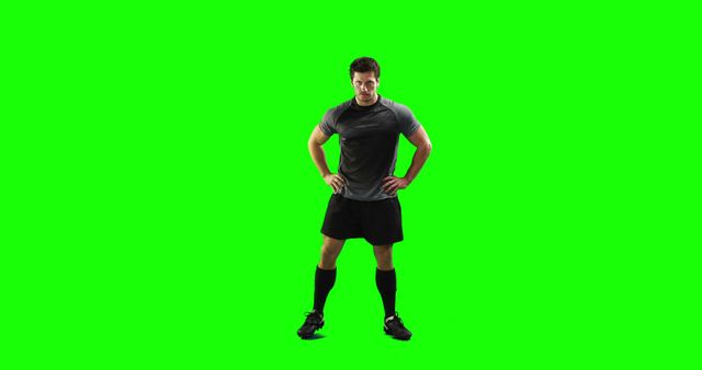 This picture showcases an athletic man standing confidently against a green screen background, which is ideal for use in fitness-related advertisements, promotional materials, and digital media where the background can be substituted for various environments. This image is perfect for fitness websites, sports campaigns, or virtual fitness training sessions.