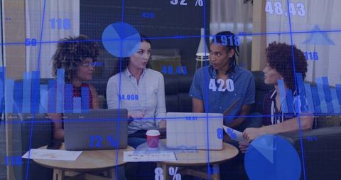 Diverse Team Collaborating with Data Projections in Modern Lounge