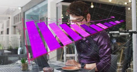 Working man typing on laptop with holographic violet bar chart overlay at cafe