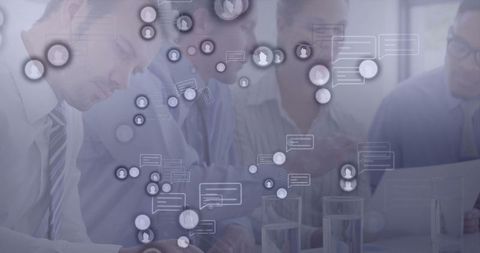 Business Team Collaborating in Modern Boardroom with Digital Icons