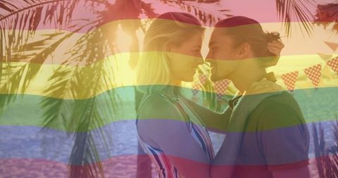 Romantic Couple Embracing on Vibrant Beach at Sunset