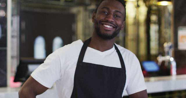 Smiling Barista in Black Apron - Download Free Stock Images Pikwizard.com