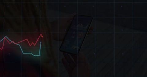 Hands Holding Smartphone with Data Charts and Line Graphs