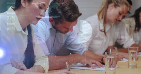 Team Engaging in Analytical Discussion with Data Visuals Overlay