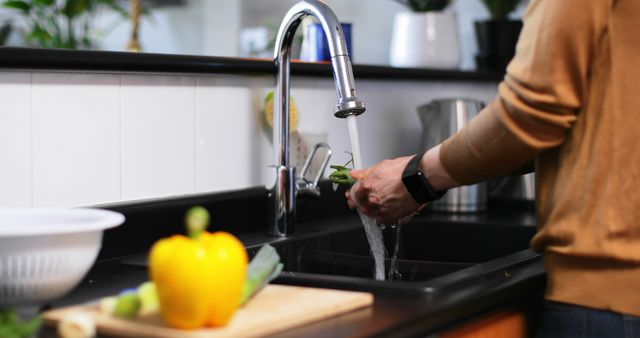 Person Washing Fresh Vegetables in Kitchen Sink Emphasizing Hygiene and Cleanliness - Download Free Stock Images Pikwizard.com