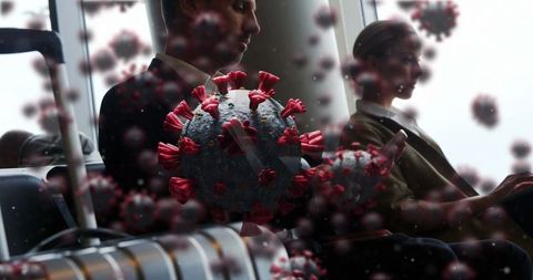 People surrounded by digital virus particles in public area