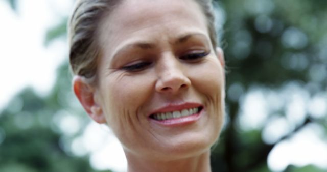 Smiling Mature Woman Outdoors in Natural Setting - Download Free Stock Images Pikwizard.com
