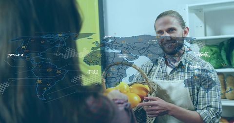 Local market vendor handing basket of oranges with digital world map supply chain overlay