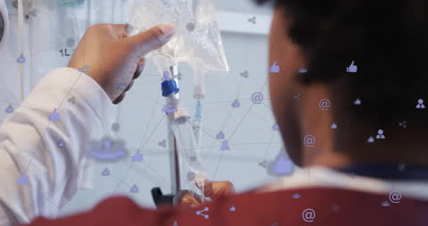 Doctor Managing IV Bags with Network of Digital Connections